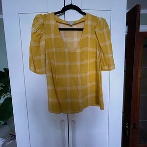 A new day yellow top